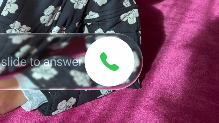 Liquid Glass slide-to-answer control over a patterned iPhone Lock Screen