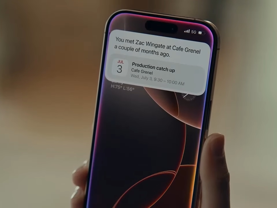 A screenshot from an Apple ad with Isabella Ramsey showing the new and updated Siri
