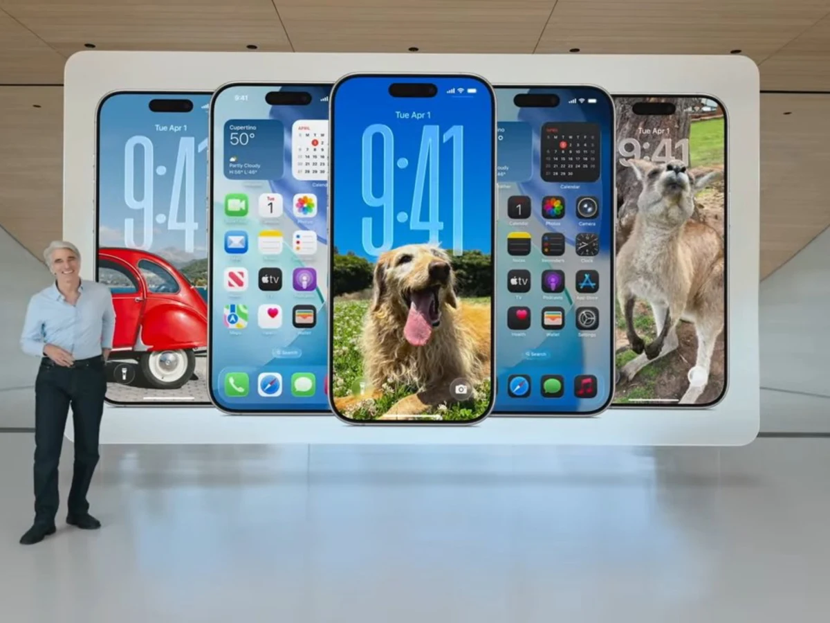 Craig Federighi beside six iPhones showing different iOS interfaces