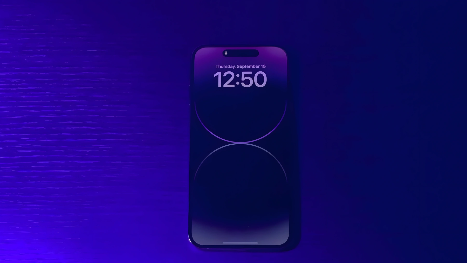 iPhone 14 Pro with a purple Always-On Lock Screen against a purple event backdrop