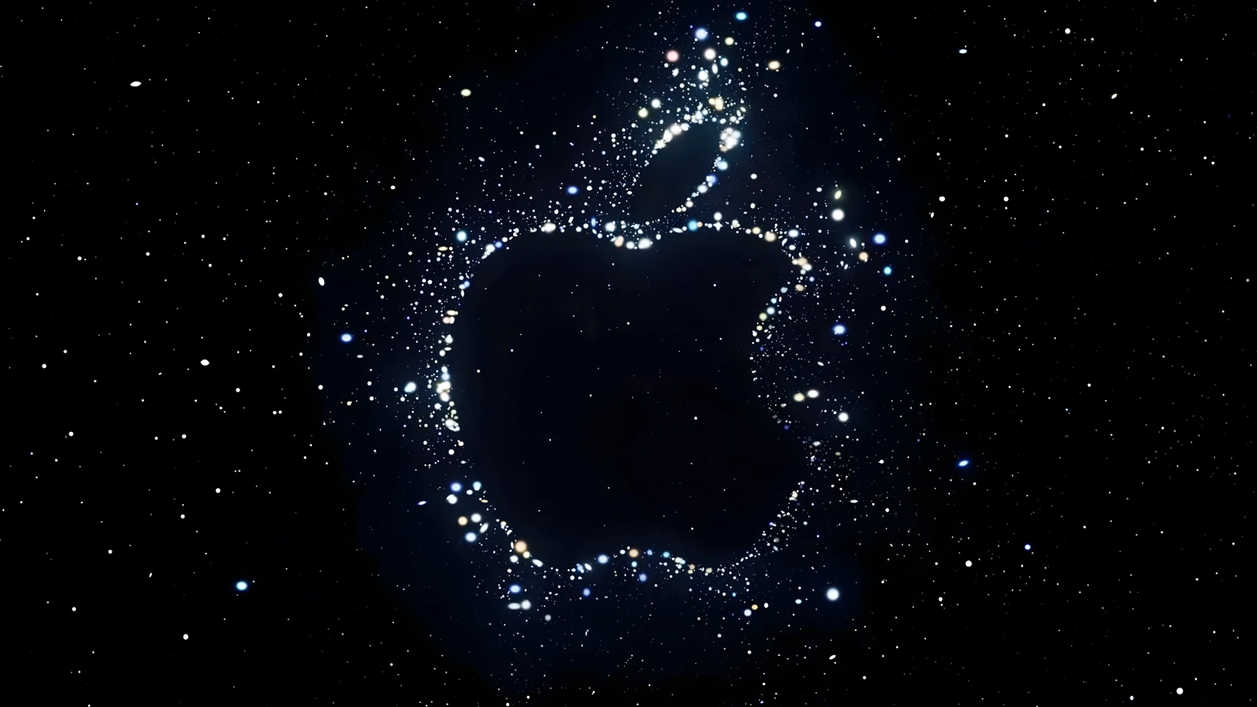 Star field forming a glowing Apple logo for the Far Out event